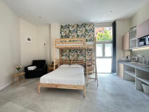 Postel nebo postele na pokoji v ubytování Calma Lofts