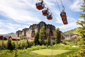 a gondola ride over a golf course at a resort at Grand Summit Lodge by Park City - Canyons Village in Park City