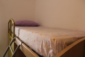 a bed in a room with a mattress on it at Appartamento smart con splendido mare sotto casa in Capo Rizzuto