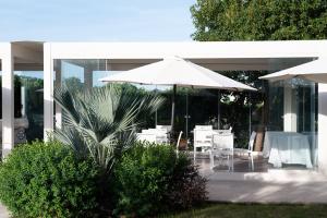 Aed väljaspool majutusasutust Il Leone Di Mare