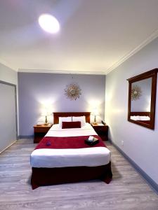 Postel nebo postele na pokoji v ubytování Hotel St. James