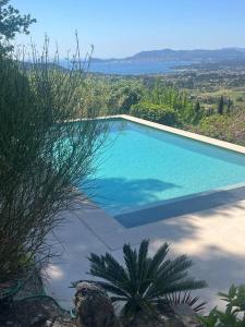 The swimming pool at or close to Luxueuse Villa avec Piscine pour 8 Personnes et Vue Mer Exceptionnelle proche des Plages