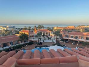 an aerial view of a resort with a swimming pool at Stunning sea view Tenerife Royal Gardens Resort! in Playa de las Americas