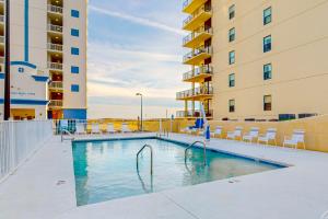 a swimming pool in the middle of a building at Perdido Dunes #20 in Orange Beach