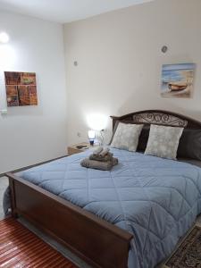Säng eller sängar i ett rum på Casa vacanza dell' abbaddu