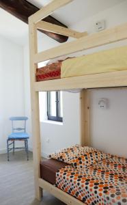 Gîte de l'Escanson un temps pour soi 객실 침대