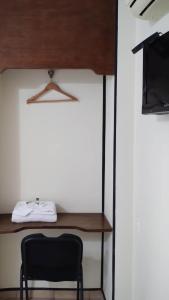 TV a/nebo společenská místnost v ubytování Hotel Mateos 1215