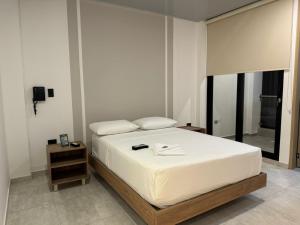 Postel nebo postele na pokoji v ubytování RB Hotel