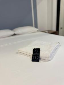 Postel nebo postele na pokoji v ubytování RB Hotel