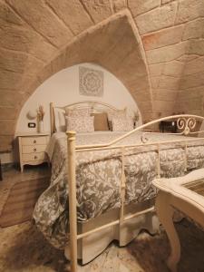 a bedroom with a bed in an attic at Stella House in Fasano