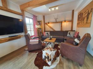 Posezení v ubytování Alpen Chalets Zell am See