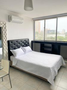 Ένα ή περισσότερα κρεβάτια σε δωμάτιο στο Hotel Estefanía Princess 84