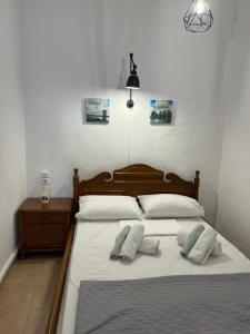 A bed or beds in a room at Το αρχοντικό της Ιωάννας ΙΙ