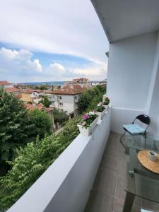 a balcony with a view of a city at SiSi Art in Varna City