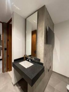 a bathroom with a sink and a mirror at Casa Valentina Habitación 5 in Aguascalientes