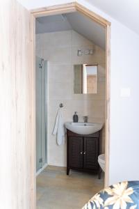 a bathroom with a sink and a mirror at Stanica Hucuł in Sułkowice +47 photos