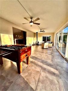 a large living room with a pool table in it at Sunrise View in Rocklin