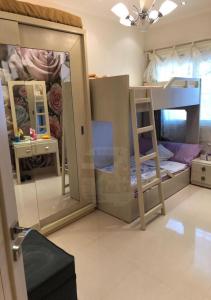 a bedroom with bunk beds and a mirror at فيلا بالكامل الساحل مارينا اطلاله فيو البحر in El Alamein