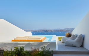 a white house with a view of the water at Phos The Boutique in Akrotiri