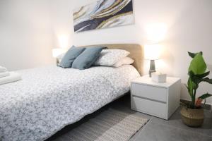 Postel nebo postele na pokoji v ubytování Wardija Maisonette
