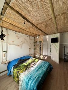 a bedroom with a large bed in a room at La Casa Delle Conchiglie in Catania +87 photos