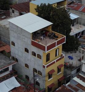 an overhead view of a building with a roof at Casa Momo in Panajachel