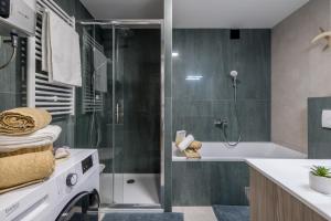 Kúpeľňa v ubytovaní Olive Shade - Apartment near the Beach + 36 fotografií