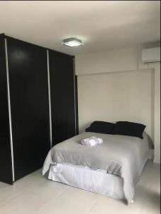 Postel nebo postele na pokoji v ubytování Apartamento studio