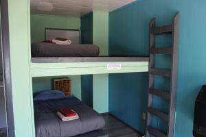 Postel nebo postele na pokoji v ubytování Seaside International Hostel