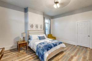 a bedroom with a bed and a desk and a window at Renovated Augusta Apartment about 1 Mi to Downtown! in Augusta