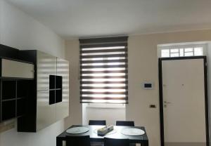 TV a/nebo společenská místnost v ubytování Casa Ramalma tra Milano-Rho Fiera, Milano, Monza, Como