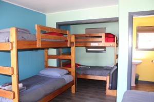 Postel nebo postele na pokoji v ubytování Seaside International Hostel