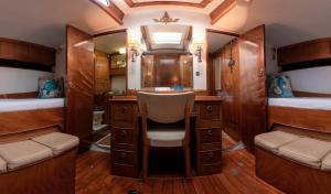 a bathroom with a sink and a mirror at Classic Boat Monte-Carlo in Monte Carlo