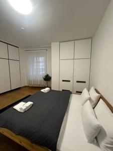 Postel nebo postele na pokoji v ubytování DATRI Petite Suite 1 - 3