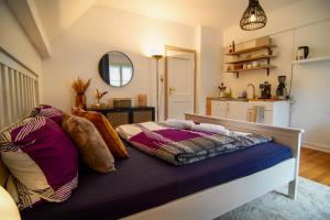 Postel nebo postele na pokoji v ubytování Apartment mit Balkon am Bergpark