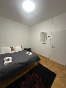 Postel nebo postele na pokoji v ubytování DATRI Petite Suite 1 - 3