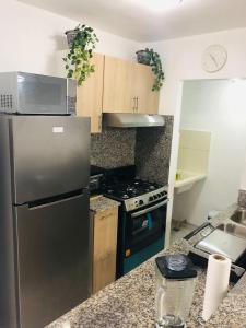 Kjøkken eller kjøkkenkrok på Apartamento amueblado