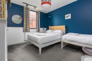 Кровать или кровати в номере ART B&B