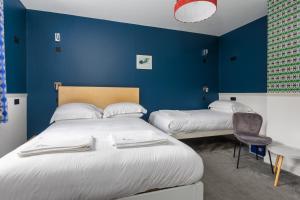 Кровать или кровати в номере ART B&B