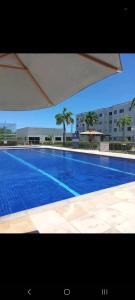 Bazén v ubytování Apto Familiar nebo v jeho okolí