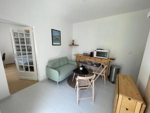 Et opholdsområde på Maison indépendante au calme - 1ch + 3 billeder