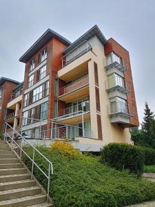 Budova, kde se apartmán nachází + 5 fotografií