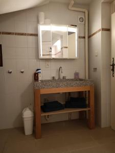 Koupelna v ubytování La Baudinière, Gîte "Le Garny" + 14 fotografií