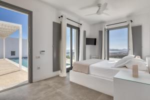 Ένα ή περισσότερα κρεβάτια σε δωμάτιο στο Villa Agkairia
