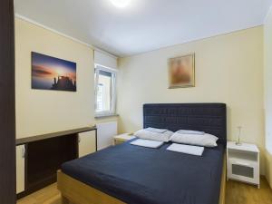 Giường trong phòng chung tại Villa Vila