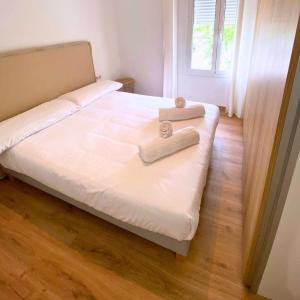 מיטה או מיטות בחדר ב-Amazing Apartment in Poblenou with 3 bedrooms