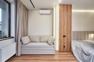 Postel nebo postele na pokoji v ubytování Apart Hotel Acropolis