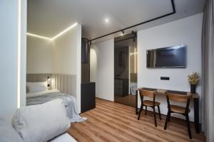 Postel nebo postele na pokoji v ubytování Apart Hotel Acropolis
