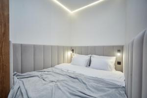 Postel nebo postele na pokoji v ubytování Apart Hotel Acropolis