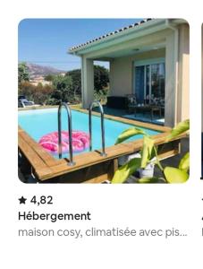 una imagen de una casa con piscina en maison cosy climatisée avec piscine et jardin en Calenzana